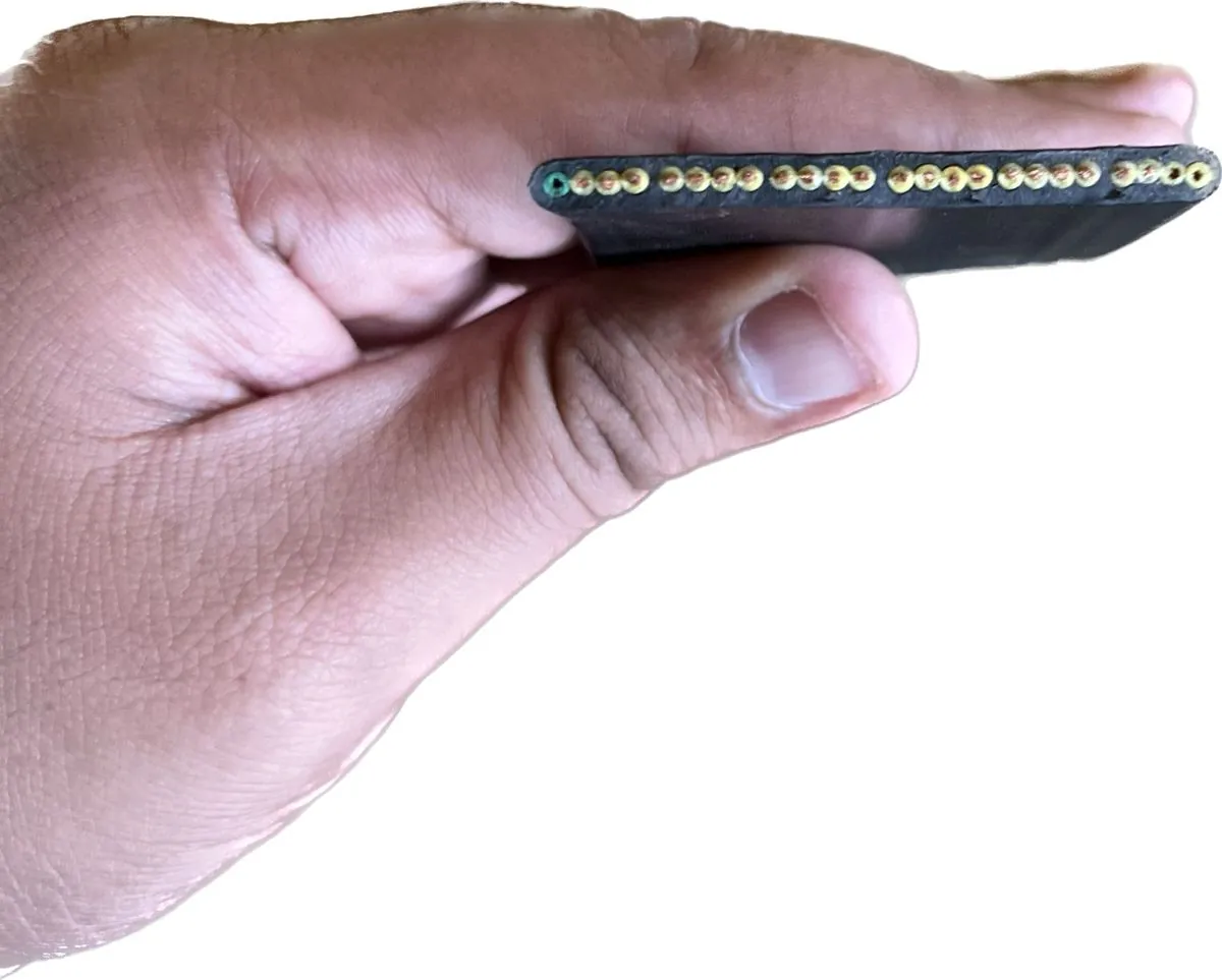 Hand holding a YBS 24 core flat elevator travelling cable